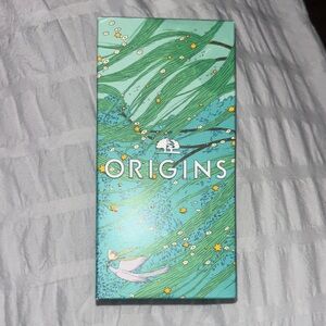 Origins Green and Yellow Illustrated Box